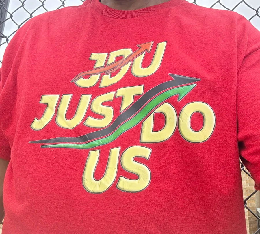 JDU Arrows logo printed on a red t-shirt