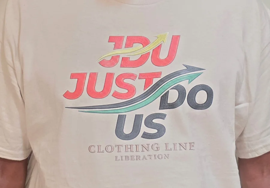 JDU Arrows logo printed on a cream t-shirt